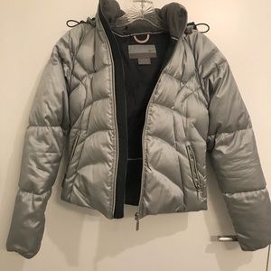 Sleek Nike silver puffer coat w/ detachable hood.